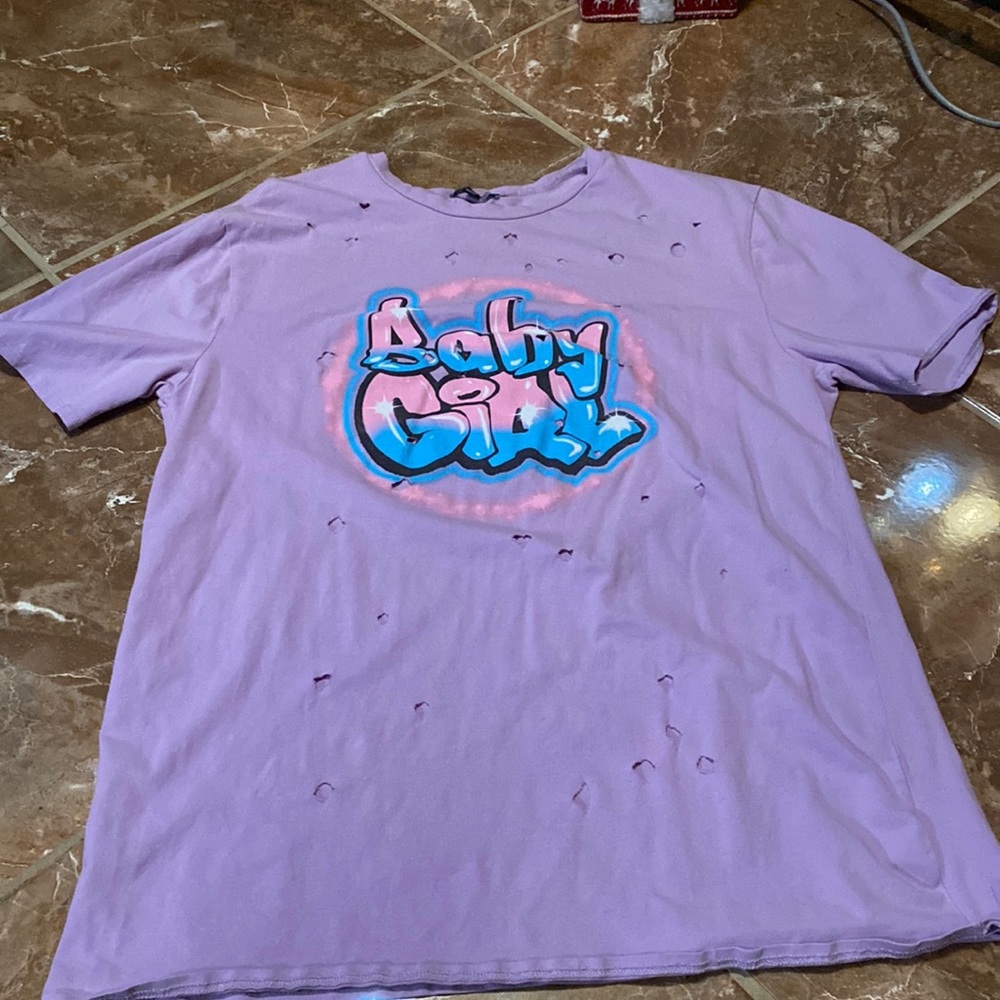 A purple babygirl Fashion Nova shirt in XL.